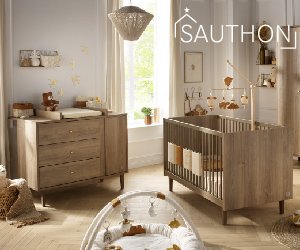 ambiance cocon dans une chambre bébé prête pour accueillir un nouveau-né